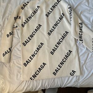 used once , perfect condition: can be used as a sweater dress it's quite long .